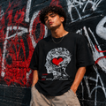 CAMISETA OVERSIZE THINK LESS FEEL MORE NEGRA